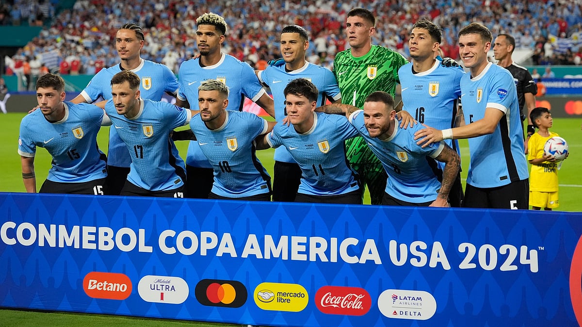 Players of Uruguay line up for a team photo before a Copa America match. - (AP Photo/Marta Lavandier)